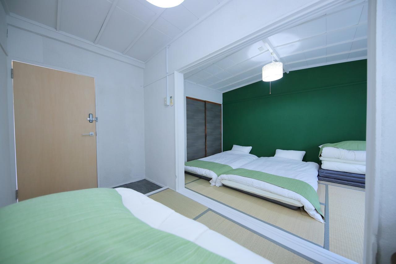 Raku Hostel Osaka Buitenkant foto