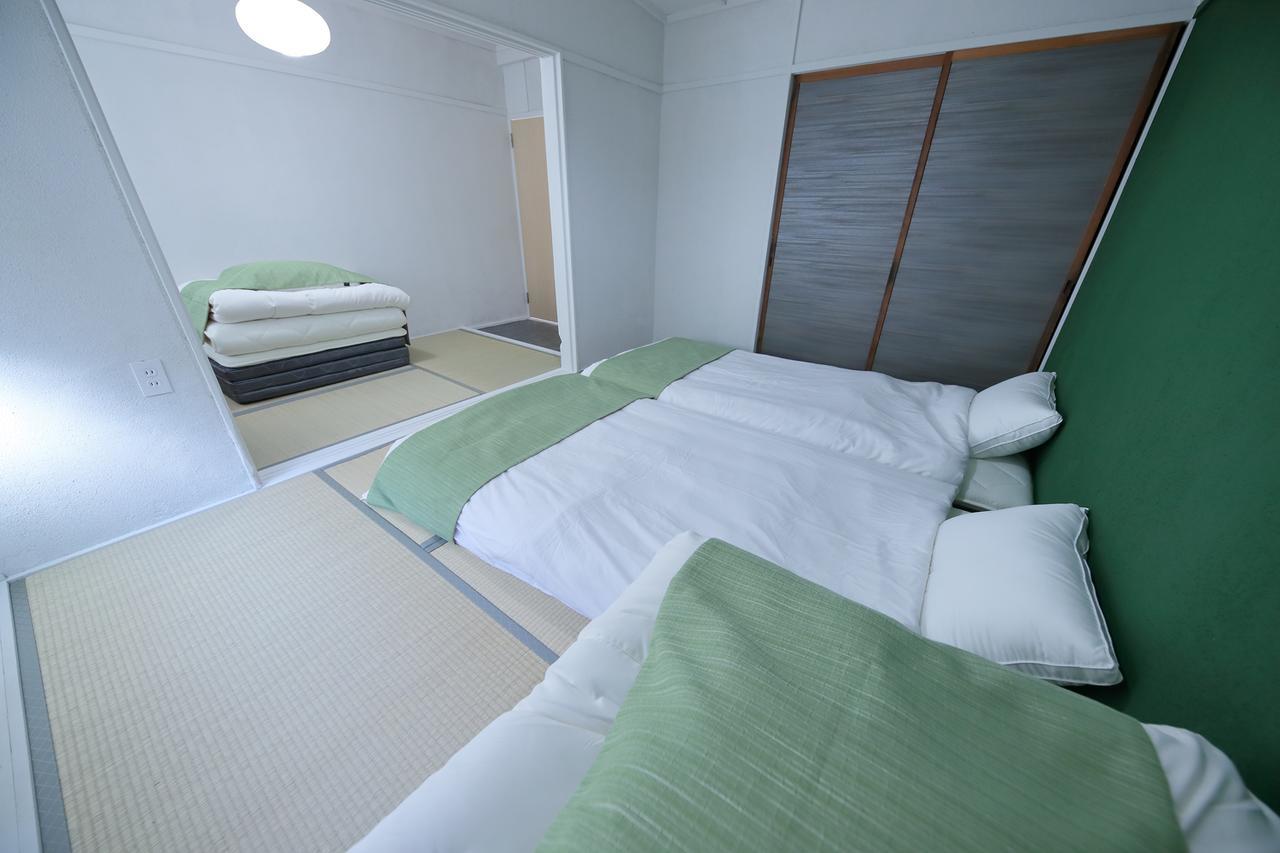 Raku Hostel Osaka Buitenkant foto