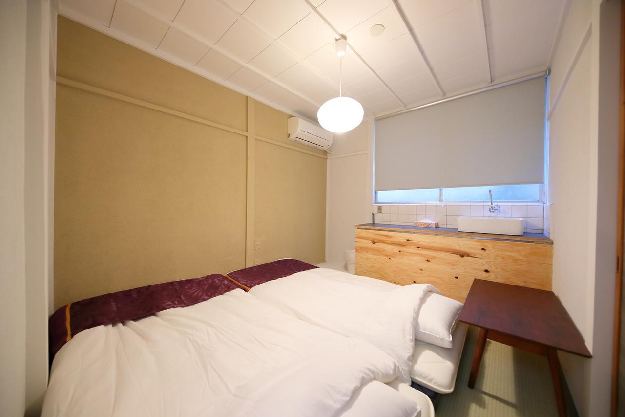 Raku Hostel Osaka Buitenkant foto