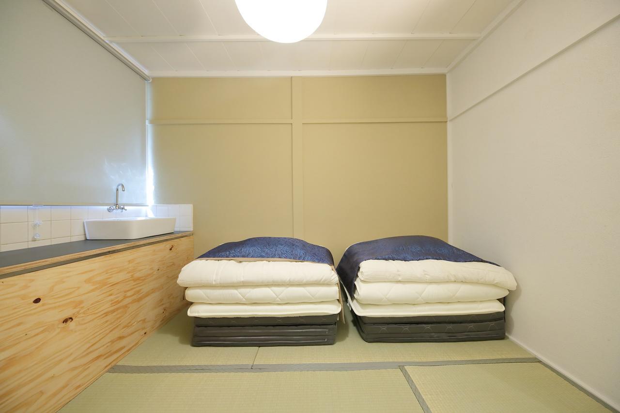 Raku Hostel Osaka Buitenkant foto