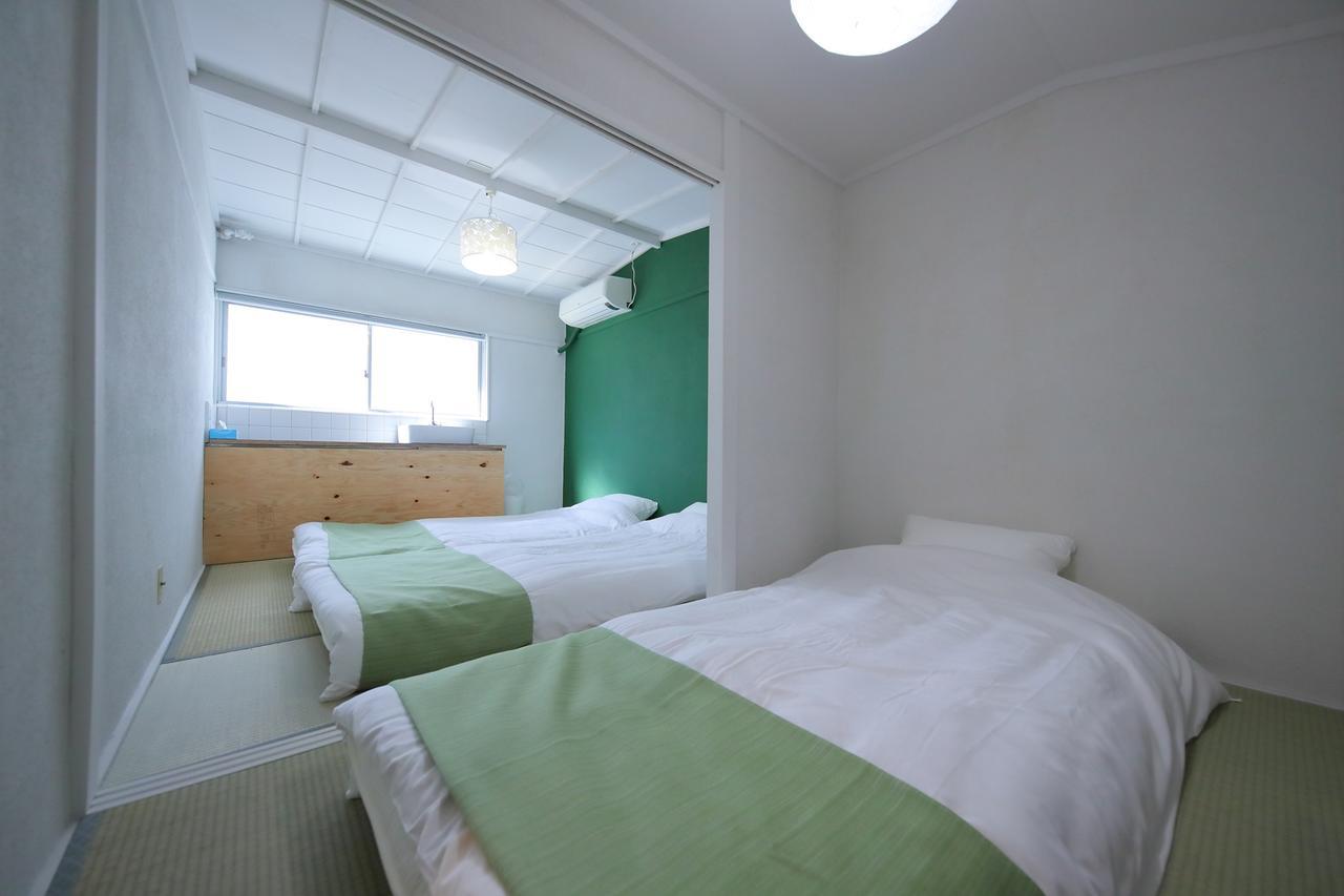 Raku Hostel Osaka Buitenkant foto