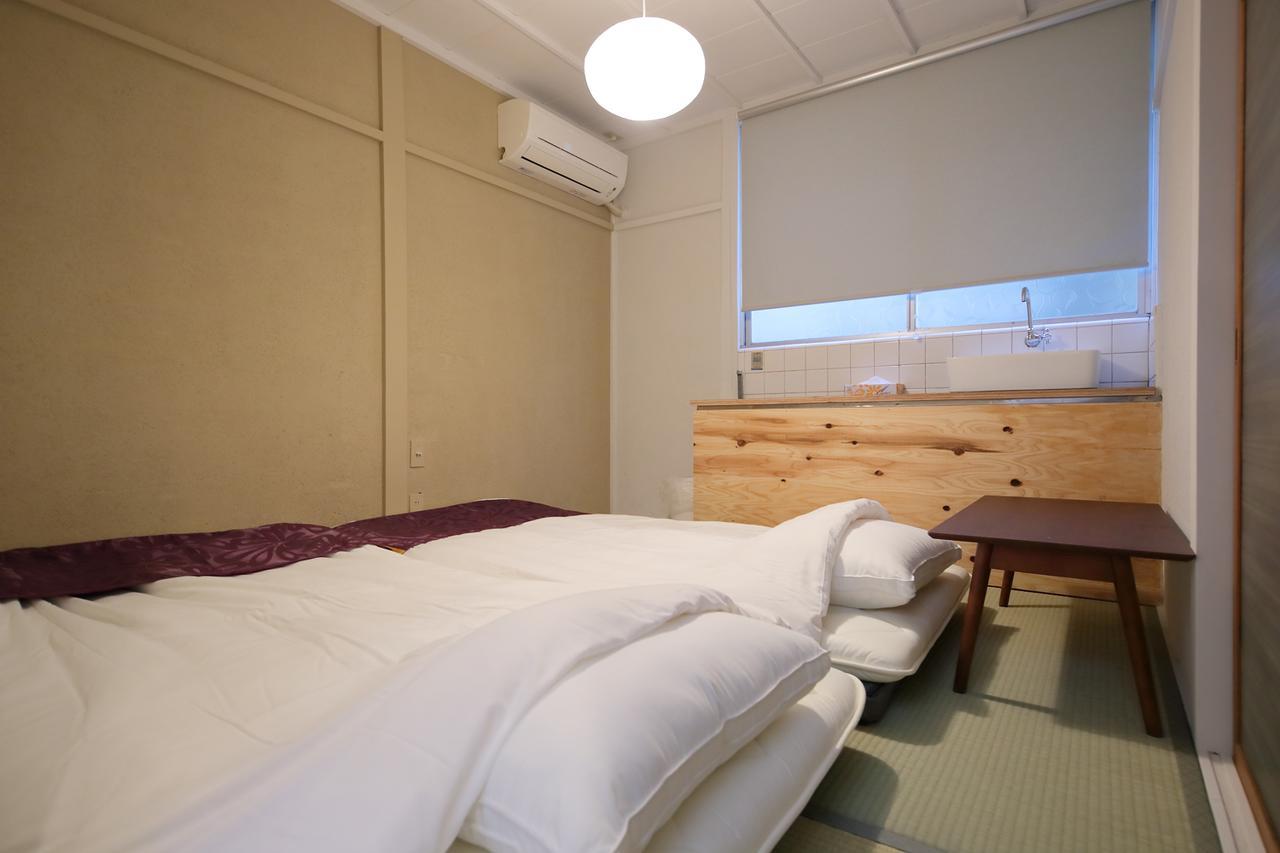 Raku Hostel Osaka Buitenkant foto