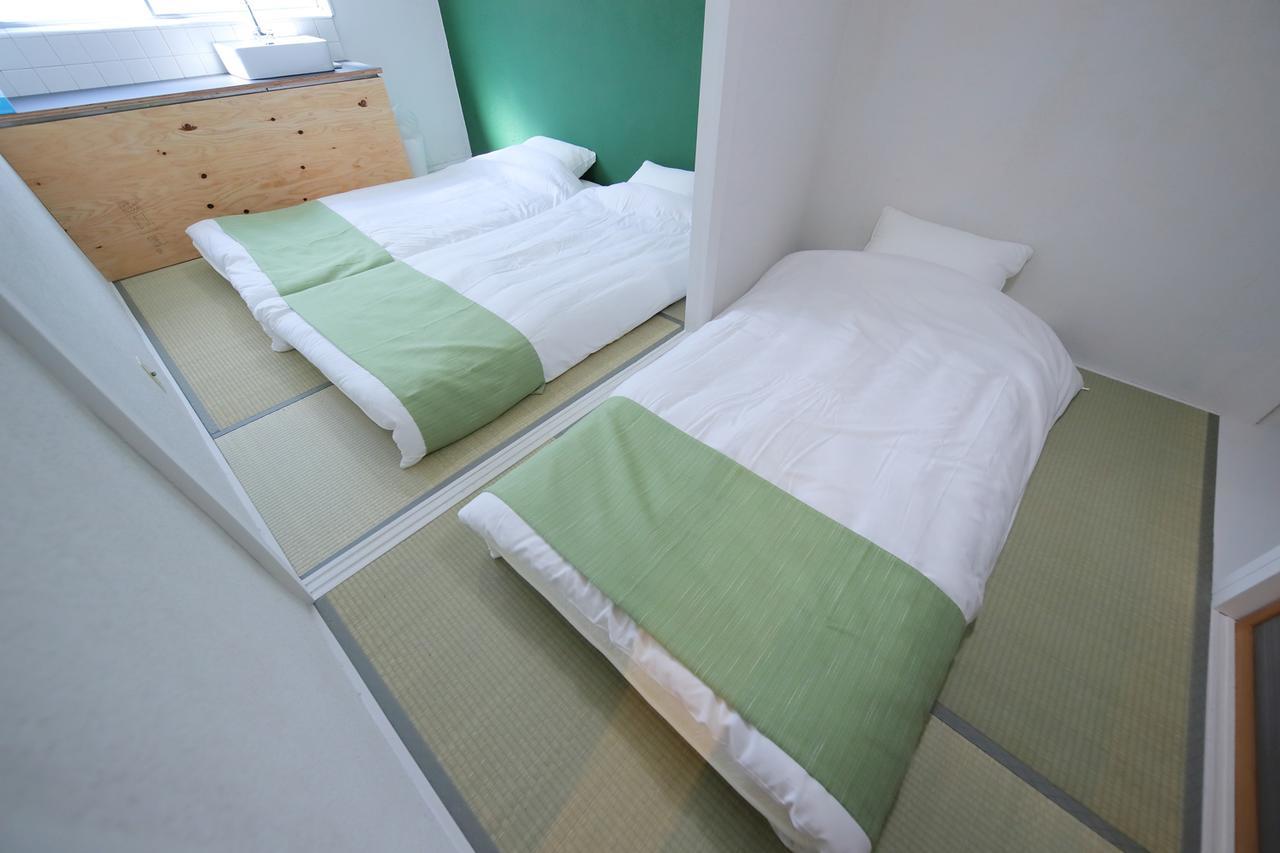 Raku Hostel Osaka Buitenkant foto