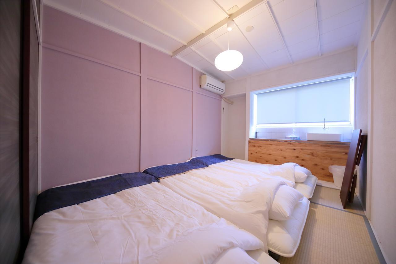 Raku Hostel Osaka Buitenkant foto