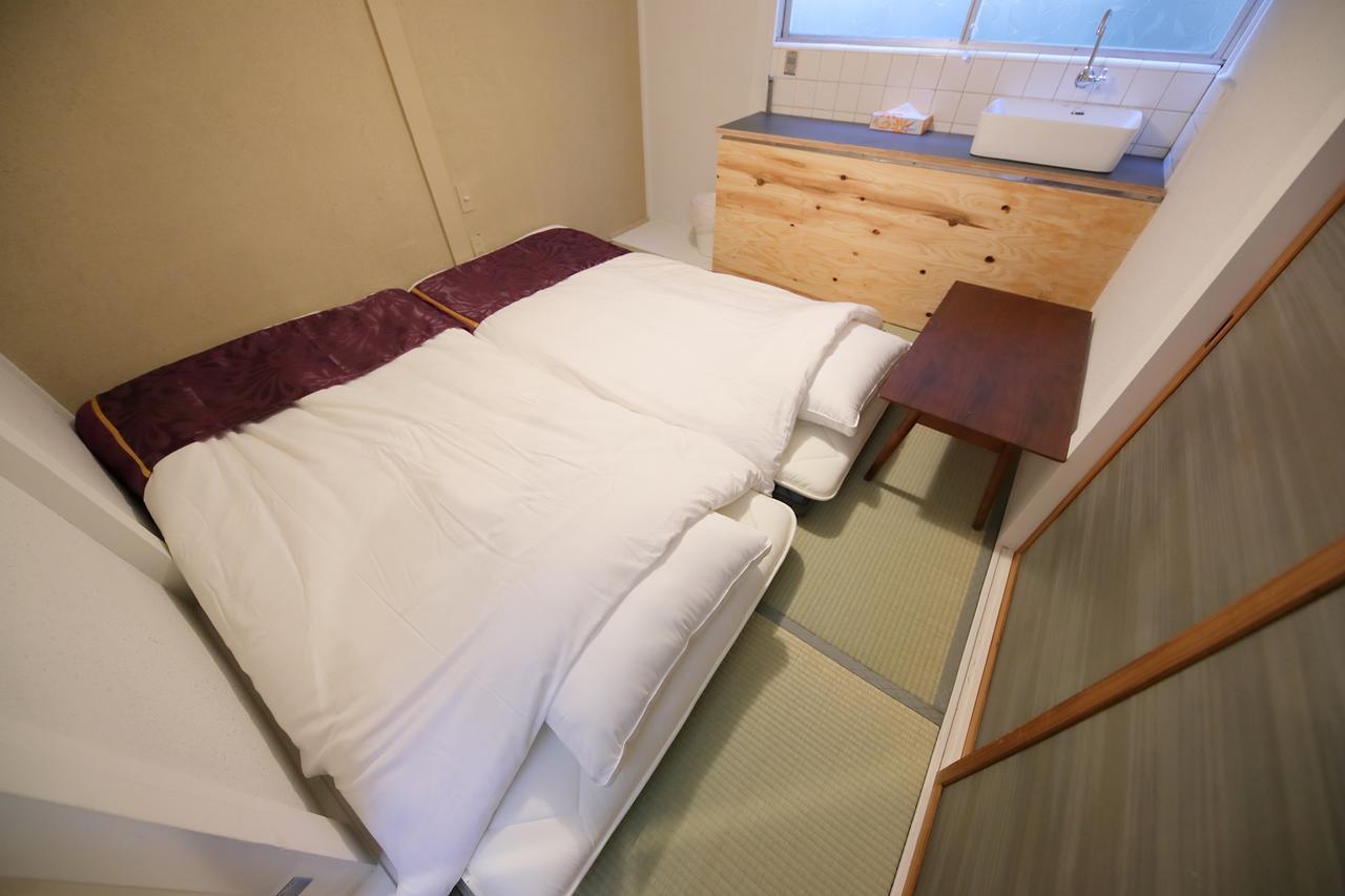 Raku Hostel Osaka Buitenkant foto